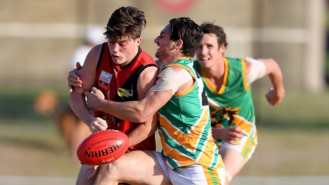 Mooroolbark’s Metin Musa tackles Knox’s Damien Byrne last season. Picture: Andy Brownbill