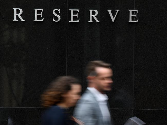 A pedestrian walks past the Reserve Bank of Australia (RBA) building in Sydney, Tuesday, March 3, 2020. The Reserve Bank is expected to cut the cash rate to a new record low 0.5 per cent on Tuesday. (AAP Image/Joel Carrett) NO ARCHIVING