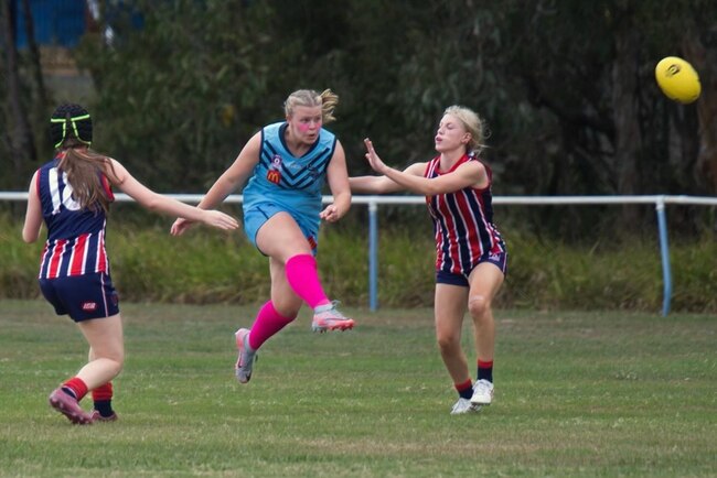 Freyja Atkins, a Wynnum Vikings junior who played her 100 junior match with the Coorparoo under-17s recently.