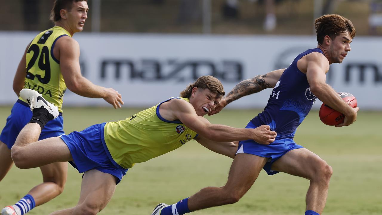 Jy Simpkin bursts through a tackler. Picture: Michael Klein