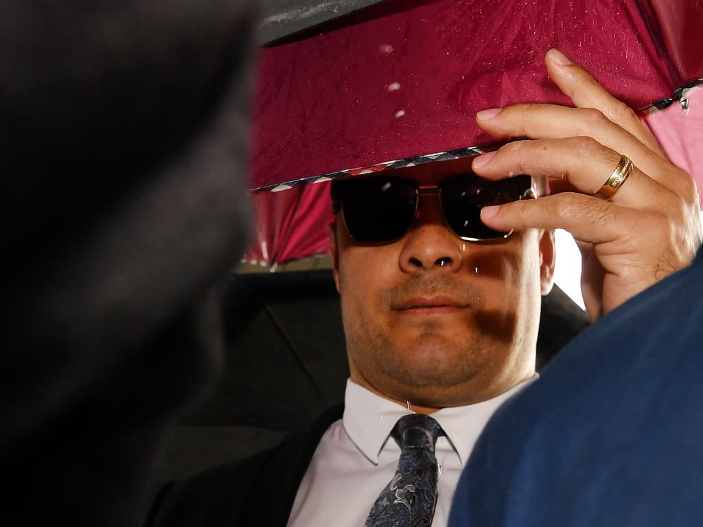 Jarryd Hayne walks into court shielded by umbrellas before he was jailed. Picture: Sam Mooy/Getty Images