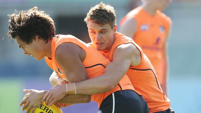 Patrick Cripps, pictured tackling team-mate Jack Silvagni, scored 137 SuperCoach points in his last match against the Suns.