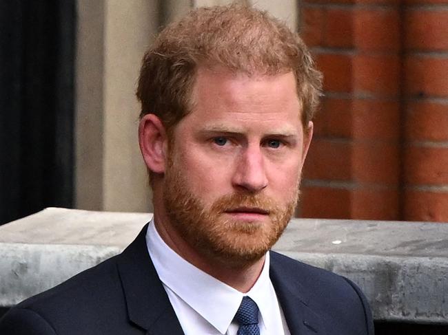 (FILES) Britain's Prince Harry, Duke of Sussex leaves from the Royal Courts of Justice, Britain's High Court, in central London on March 27, 2023. Lawyers for Prince Harry on December 5 began a legal challenge over his security arrangements in the UK, after he quit frontline royal duties and moved to North America.  The case about his loss of UK taxpayer-funded protection is the latest in a string of court proceedings initiated by Harry, whose father is King Charles III. (Photo by JUSTIN TALLIS / AFP)