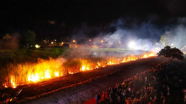 The cane is lit on fire at Sweet Days, Hot Nights.