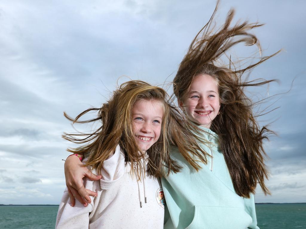 Willow and Matilda Beaven are freezing in Darwin. Picture: Glenn Campbell