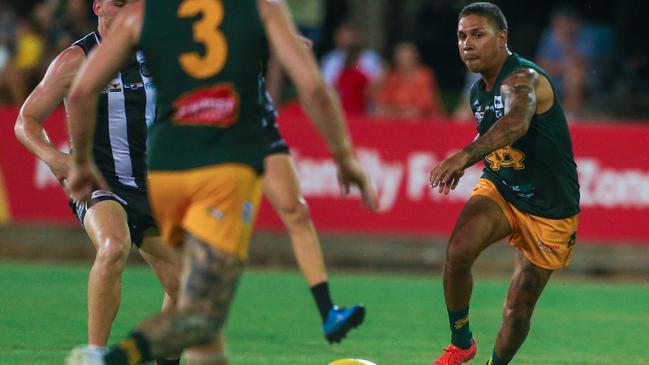 Nick Yarran rushes towards the ball against a Gary Ablett Jr bolstered Palmerston. Picture: Glenn Campbell