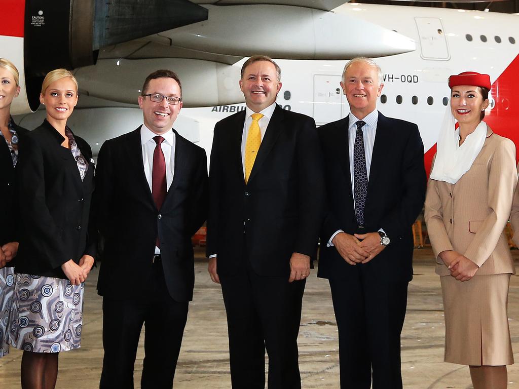 Qantas CEO Alan Joyce, second from left and then-Transport Minister Anthony Albanese, ventre, with Emirates President Tim Clark with Qantas and Emirates hostesses at the launch of first flight to Dubai under Qantas/Emirates codeshare partnership.