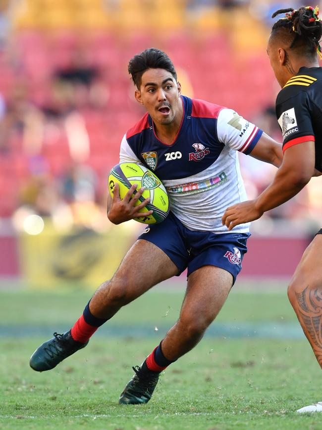 Jayden Ngamanu (left) of the Reds takes on Sean Wainui of the Chiefs during the Brisbane Global Rugby Tens quarterfinal match between the Queensland Reds and the Chiefs at Suncorp Stadium in Brisbane, Saturday, February 10, 2018. Picture: AAP/Darren England