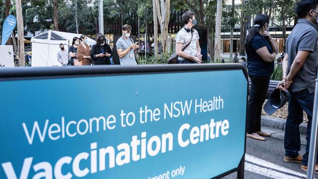 People queue to enter the NSW Vaccination Centre in Homebush, Sydney. Picture: NCA NewsWire / James Gourley