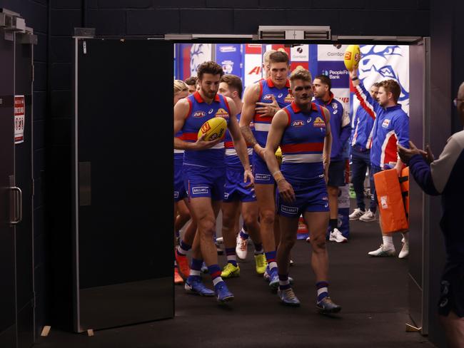 Adam Treloar leads the Bulldogs out in his 250th AFL game. Picture: Darrian Traynor/Getty Images