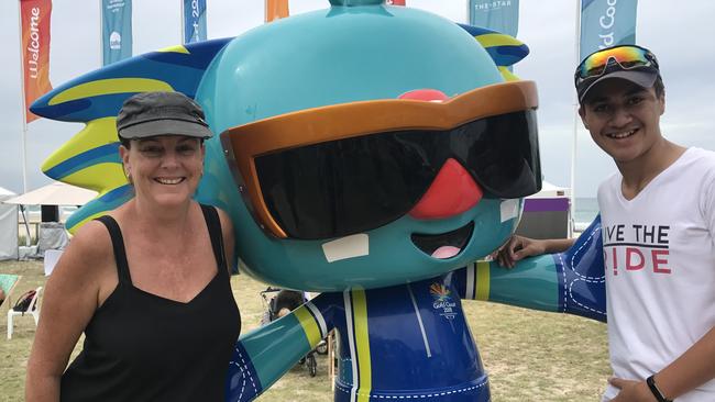 Spectators get a photo with Borobi at the cycling in Currumbin.