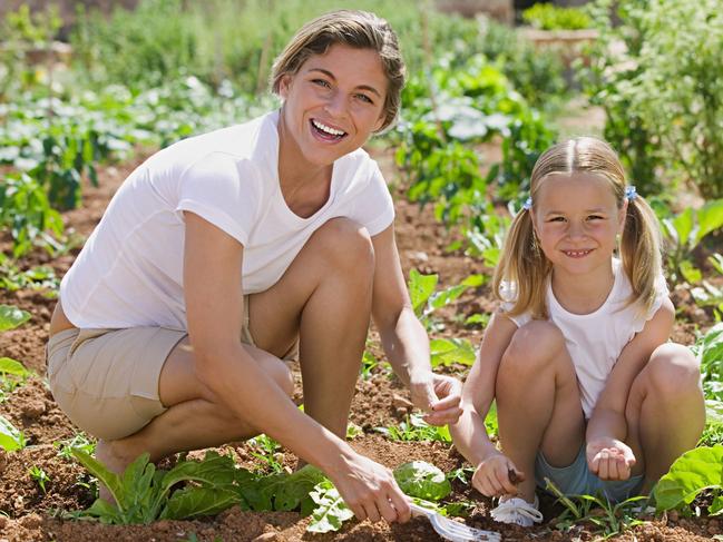 Mother and daughter gardening