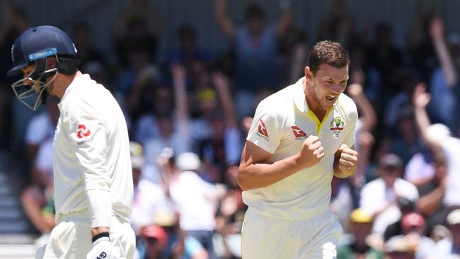 Australia's Josh Hazlewood celebrates the wicket of England's James Vince, caught behind for 25 on Day 1 of the Third Test. Photo: AAP