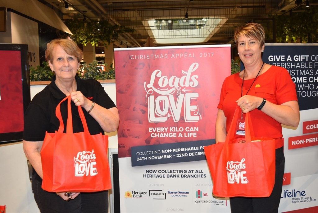 Helen Muller from METRO Care and Katrina King from the Heritage Bank Pittsworth branch man the collection booth at Grand Central