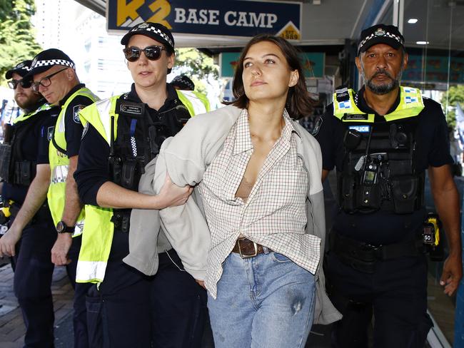 BRISBANE, AUSTRALIA - NewsWire Photos MAY 6, 2024: A pro Palestine supporter is arrested by police during the Labour Day march in Brisbane. Picture: NCA NewsWire/Tertius Pickard