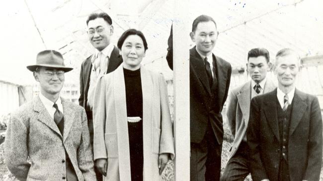 Fred Korematsu (second from right in the background) with his family in the 1940s. 