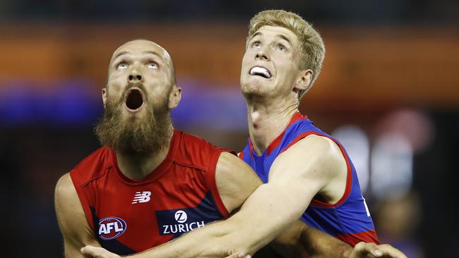 MELBOURNE, AUSTRALIA - MARCH 08: Max Gawn of the Demons and Tim English of the Bulldogs contest the ruck during the AFL Community Series match between the Western Bulldogs and the Melbourne Demons at Marvel Stadium on March 08, 2021 in Melbourne, Australia. (Photo by Daniel Pockett/Getty Images)