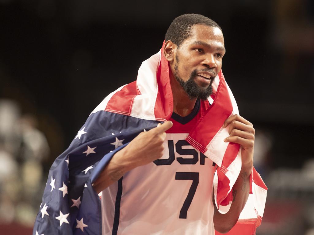 Kevin Durant celebrates after winning his third gold medal. (Photo by Tim Clayton/Corbis via Getty Images)