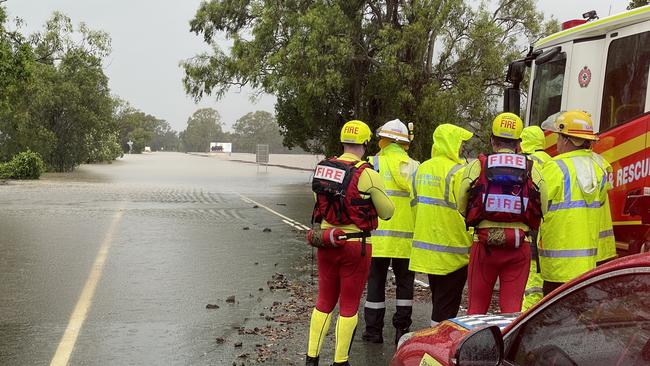 QFES crews are responding to a truck stranded in floodwaters at Pimpama. Picture: Charlton Hart