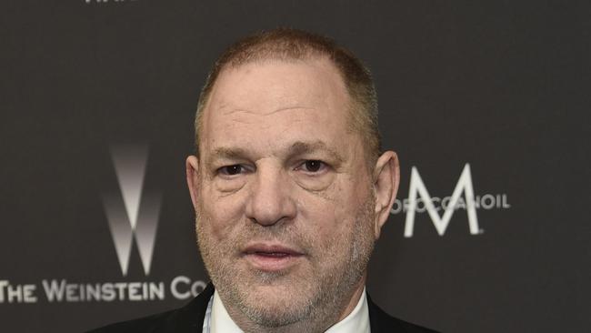 FILE - In this Jan. 8, 2017, file photo, Harvey Weinstein arrives at The Weinstein Company and Netflix Golden Globes afterparty in Beverly Hills, Calif. Weinstein is accused by dozens of women of sexual harassment or assault. He was fired by The Weinstein Co., expelled from various professional guilds and is under investigation by police departments in New York, London, Beverly Hills and Los Angeles. He denies all allegations of non-consensual sex, but he has apologized for causing "a lot of pain" with "the way I've behaved with colleagues in the past." (Photo by Chris Pizzello/Invision/AP, File)