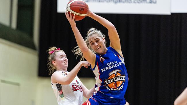 Mia Stower grabs a rebound for Toowoomba. Picture: Kevin Farmer