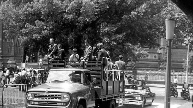 The newspapermen follow behind the astronauts in the 1969 Goodwill parade. Picture: Ed Harbas