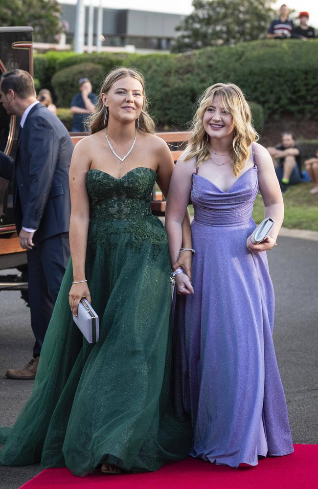 Graduate Chelsea Rieck (left) and partner Hannah Dolphin at Mary MacKillop Catholic College formal at Highfields Cultural Centre, Thursday, November 14, 2024. Picture: Kevin Farmer