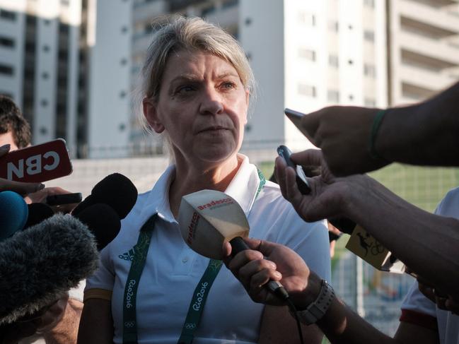 The Chef de Mission for Australia at the 2016 Rio Olympic Games, Kitty Chiller, speaks to the press after deciding not to move into the Olympic Village on its opening day in Rio de Janeiro, Brazil, on July 24, 2016. The Olympic Village in Rio officially opened its doors to the world's athletes on Sunday, less than two weeks before the Games begin -- but Australia, Britain and Brazil spurned the facility, which was dubbed "not safe or ready." / AFP PHOTO / YASUYOSHI CHIBA