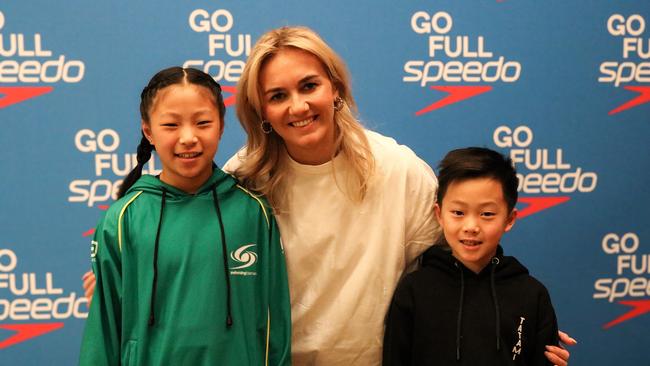 Tassie golden girl Ariarne Titmus makes a splash in Launceston meeting fans Jagger (8) and Jasmine Liu (10) from Launceston. Picture: Stephanie Dalton