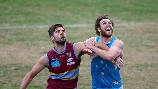 Marcellin’s Mitch Jones does battle in the ruck against Monash Blues’ Mitch King. Picture: George Salpigtidis