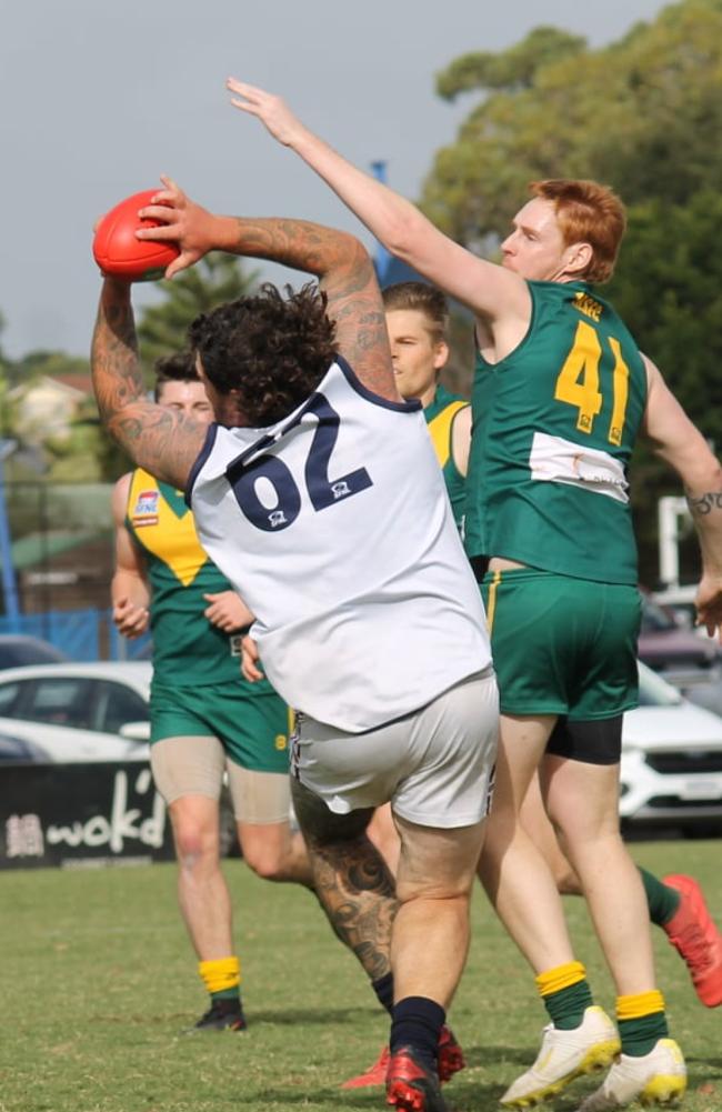 “Buzz’’ Nilan marks for Narre South Saints.