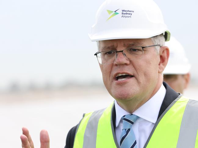 SYDNEY, AUSTRALIA - NewsWire Photos NOVEMBER 19, 2021: Prime Minister Scott Morrison pictured during a press conference after a visit the site of the new Western Sydney Airport that is now under construction at Badgerys Creek.Picture: NCA NewsWire / Damian Shaw