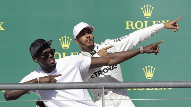 Sprinter Usain Bolt, left, and Mercedes driver Lewis Hamilton.