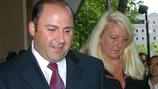 Tony Mokbel (left) with his legal team Nicola Gobbo (behind, centre) and Con Heliotis QC (right) outside Magistrates court.