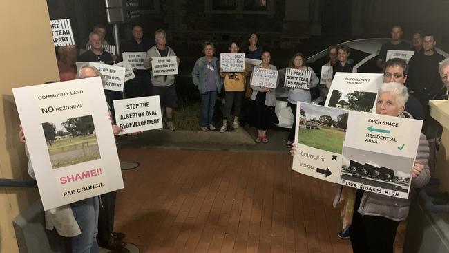 Protesters expressing their views on the proposed Alberton Oval, redevelopment at Tuesday night's Port Adelaide Enfield Council meeting. Picture: Paula Thompson