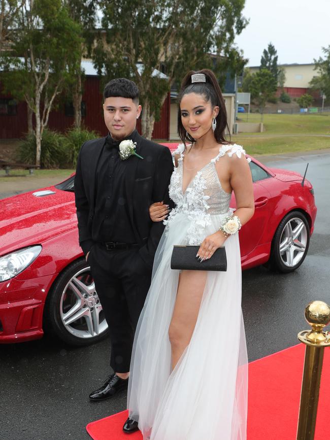 Pacific Pines High formal, at the school. Thyler Wright & Eva Close Picture Glenn Hampson
