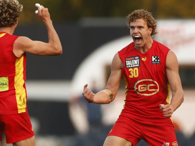 Jed Walter of the Suns (R) celebrates a goal during a Coates League match. Picture: Daniel Pockett/AFL Photos/via Getty Images