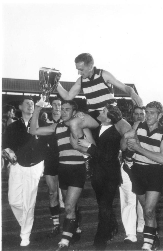 Fred Wooller is chaired from the field after the grand final.