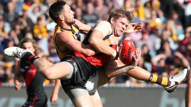 Michael Hurley battles with Jack Gunston. Picture: Michael Klein