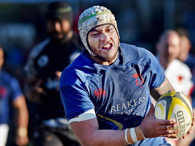 EXPRESS ADVOCATE/AAP. Elekana Laupola goes over to score for Terrigal Trojans during their Rugby Union match v Ourimbah Razorbacks at The Haven Oval at Terrigal on Saturday, August 10. (AAP IMAGE / Troy Snook)