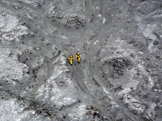 Members of the specialist team during the search for bodies on White Island. Picture: New Zealand Defence Force via Getty Images