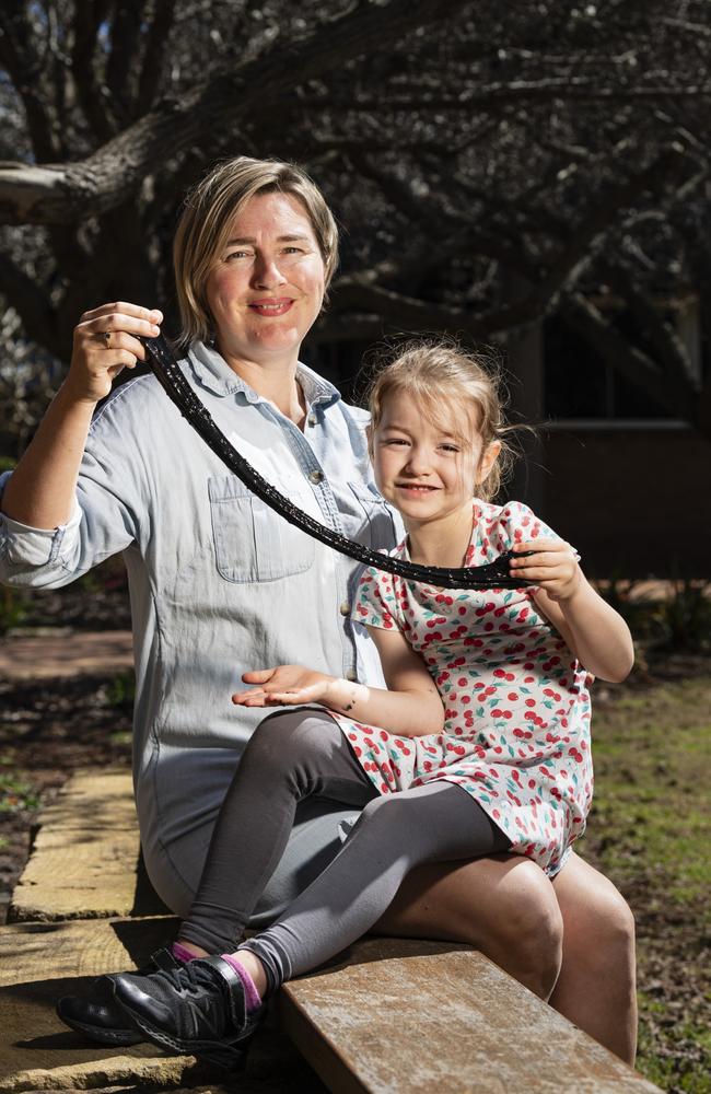 Keeley Henderson and daughter Poppy Henderson-Currey play with space slime Poppy made at iLaunch Space family fun day, part of UniSQ's Open Day, Sunday, August 18, 2024. Picture: Kevin Farmer