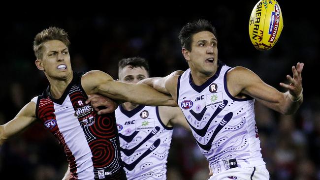 Matthew Pavlich fights for the ball with Sean Dempster. Picture: Colleen Petch