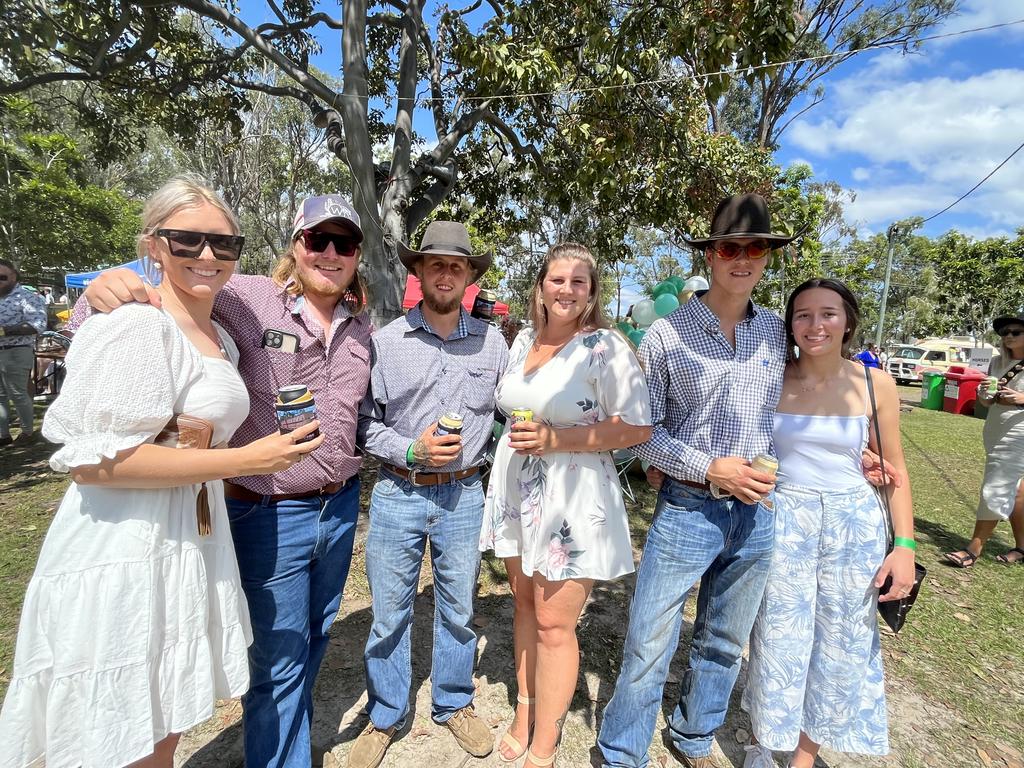 A group having fun at the Torbanlea Picnic Races.