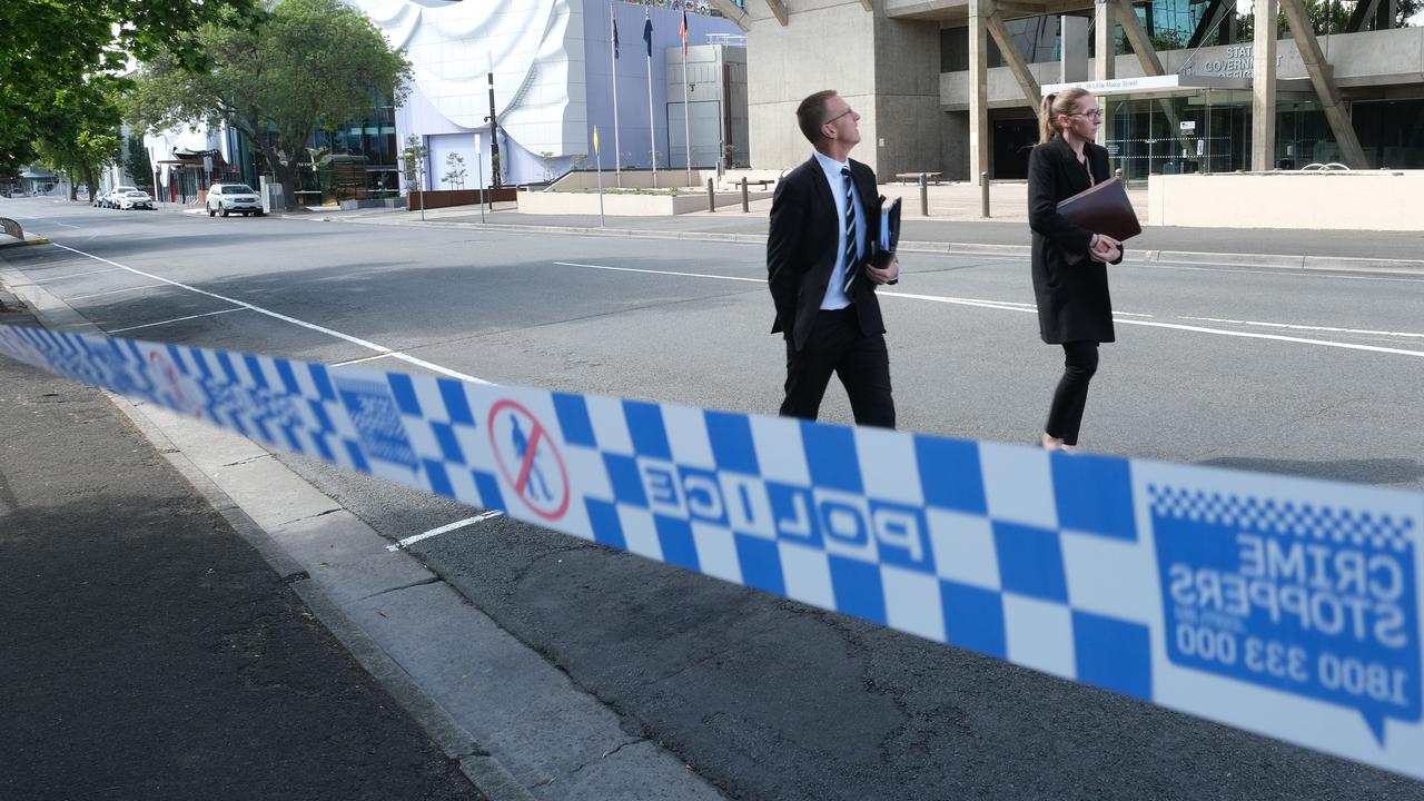 Detectives at the scene of an alleged stabbing. Picture: Mark Wilson