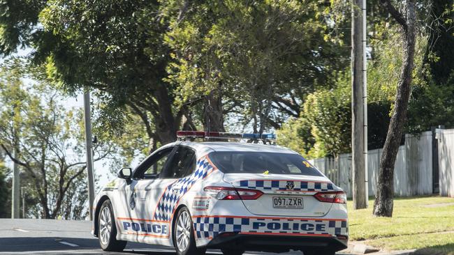 Police look for the driver of a Toyota Landcruiser utility that crashed at Long and Geddes Streets. Sunday, April 16, 2023. Picture: Nev Madsen.