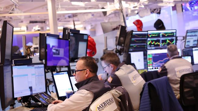 Traders work on the floor of the New York Stock Exchange. Picture: Michael M. Santiago/AFP