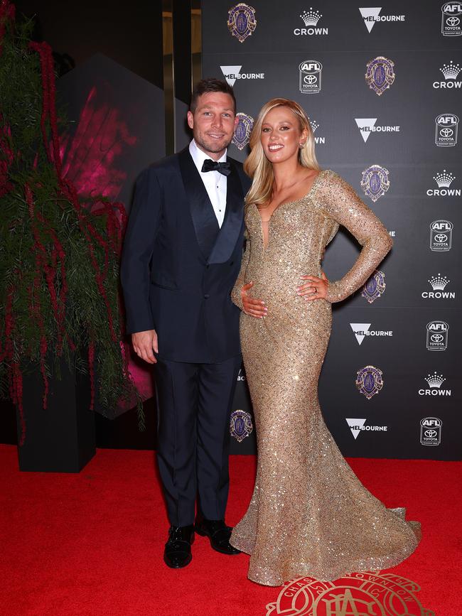 Toby Greene in P Johnson suit and Jimmy Choo shoes and Georgia Stirton. Picture: Getty Images