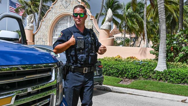 A local law enforcement officer in front of Mar-A-Lago in Palm Beach. Picture; AFP.