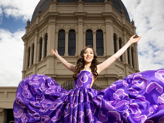 MELBOURNE, SEPTEMBER 29, 2022: Herald Sun Aria finalist Amelia Wawrzon poses on the Royal Exhibition Building's Dome Promenade, which will reopen to the public in October for the first time in 100 years. Picture: Mark Stewart